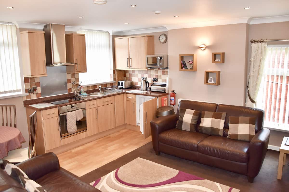 Family Apartment, 2 Bedrooms | Iron/ironing board, WiFi (free), bed sheets