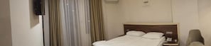 Minibar, desk, blackout drapes, soundproofing