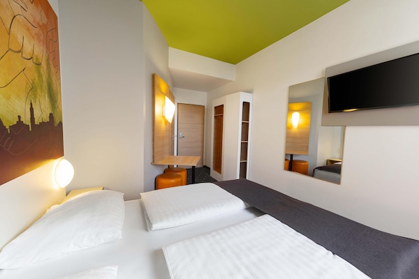 Roba de llit hipoal·lergògena, escriptori, wifi gratuïta i roba de llit