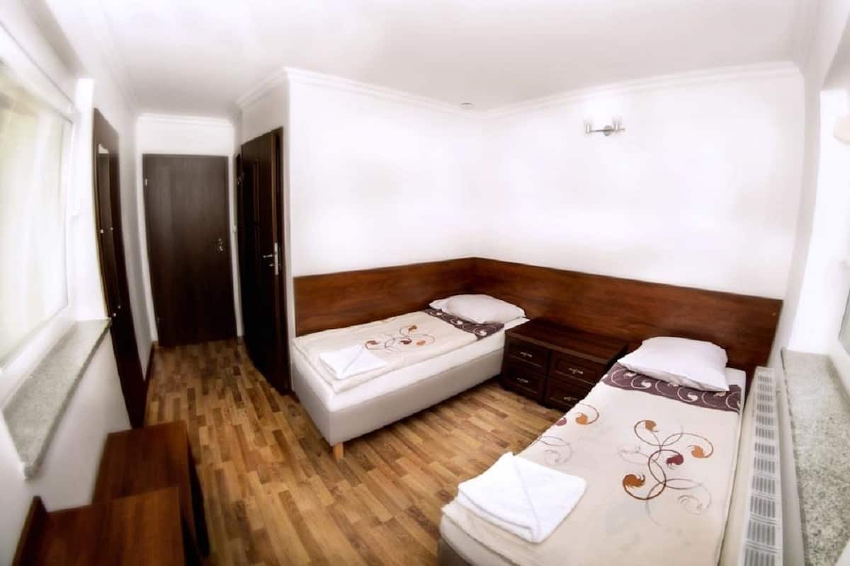 Double or Twin Room | Iron/ironing board, WiFi (free), bed sheets