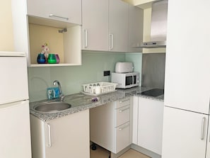 Full-size fridge, microwave, stovetop, espresso maker