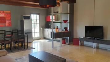 Apartamento (Cocoon) | Sala de estar | TV de tela plana