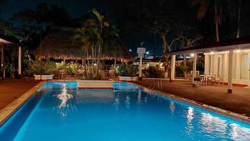 2 outdoor pools, open 7 AM to 10 PM, pool umbrellas