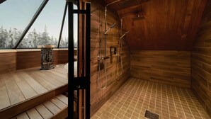 A wooden sauna with a skylight, a wooden bench, and a shower area. - Northern Lights Village Levi (Kittila)