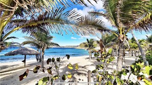 On the beach, sun-loungers, beach towels