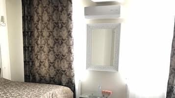 Blackout curtains, iron/ironing board, free WiFi, bed sheets