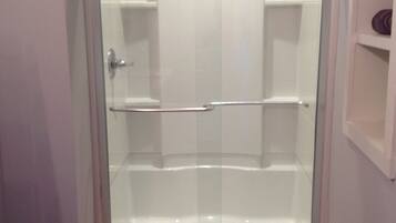 Combined shower/tub, hair dryer, towels, soap