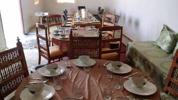 Breakfast, lunch, dinner served; local cuisine