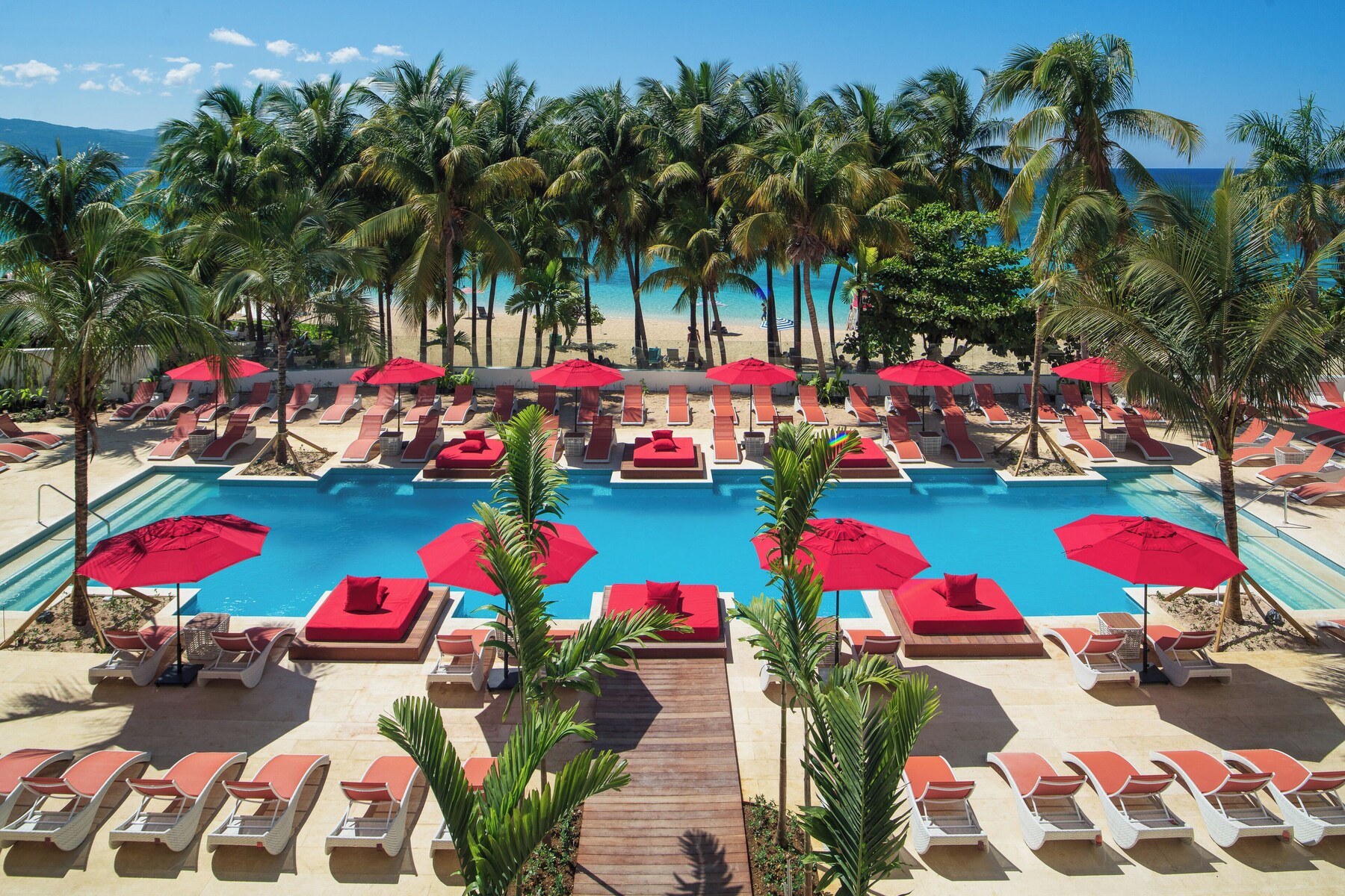 2 outdoor pools, pool umbrellas, pool loungers