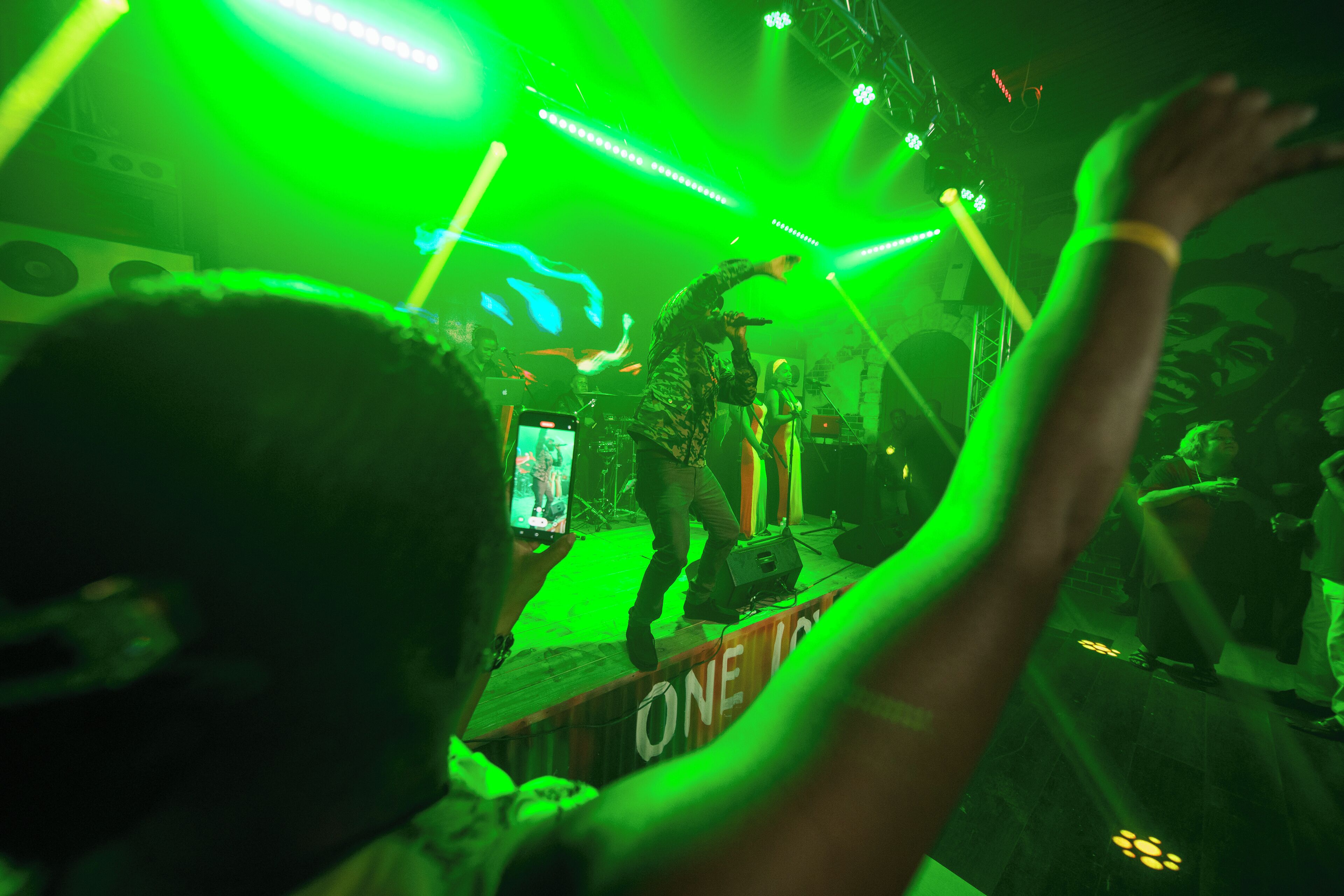 A concert with a stage and audience.