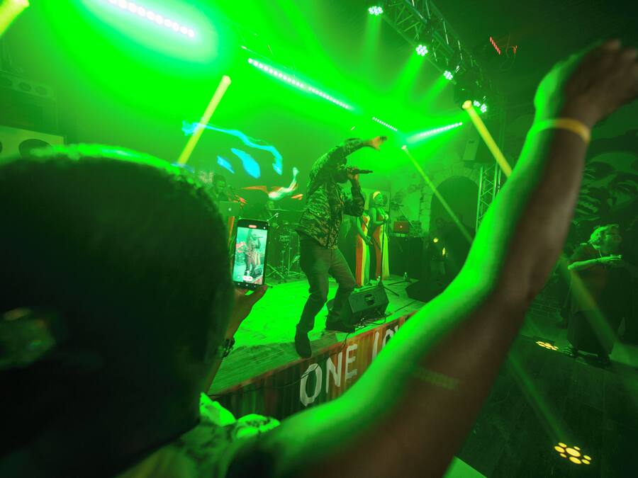 A concert with a stage and audience.