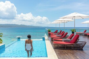 2 outdoor pools, pool umbrellas, pool loungers