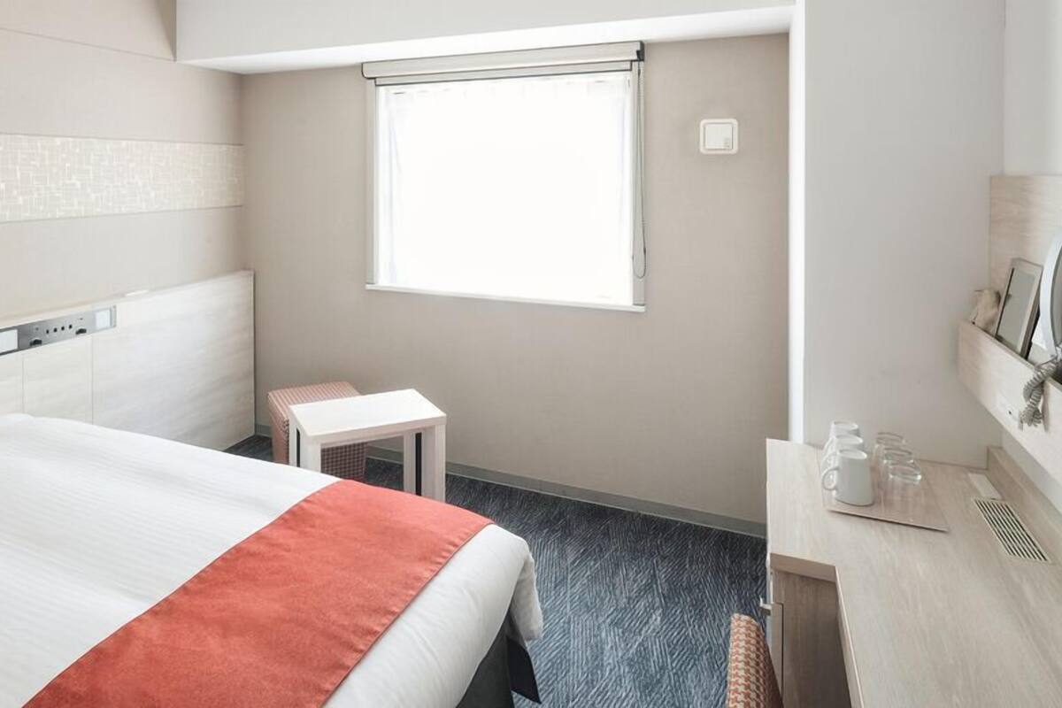 Desk, blackout curtains, iron/ironing board (on request), free WiFi
