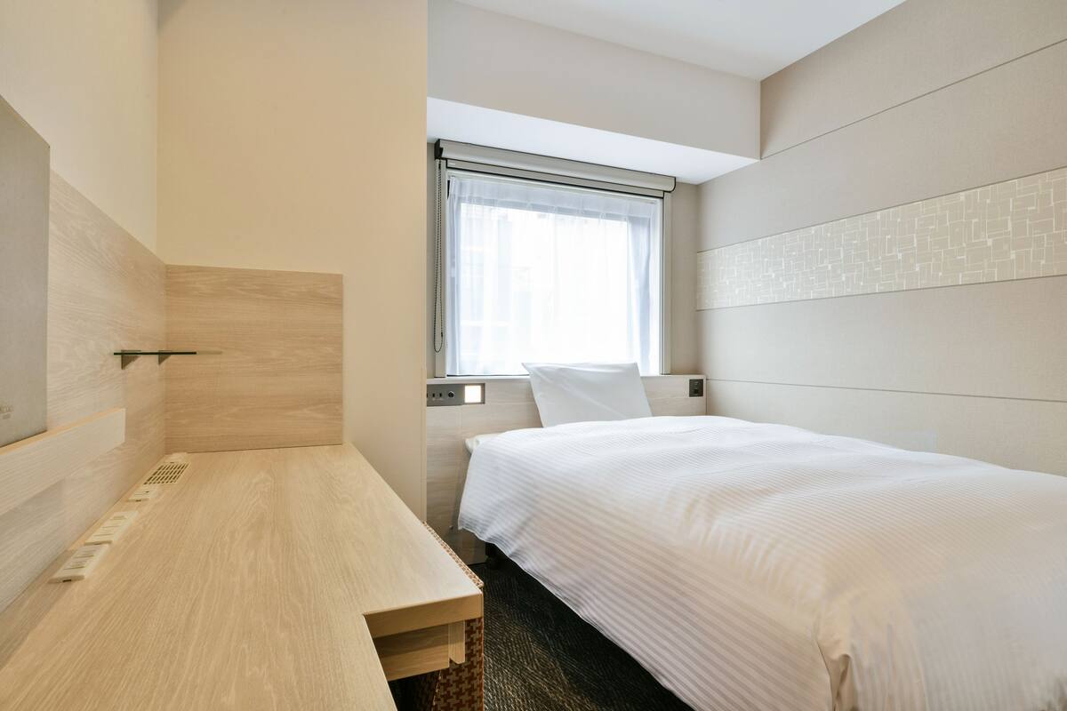 Desk, blackout curtains, iron/ironing board (on request), free WiFi