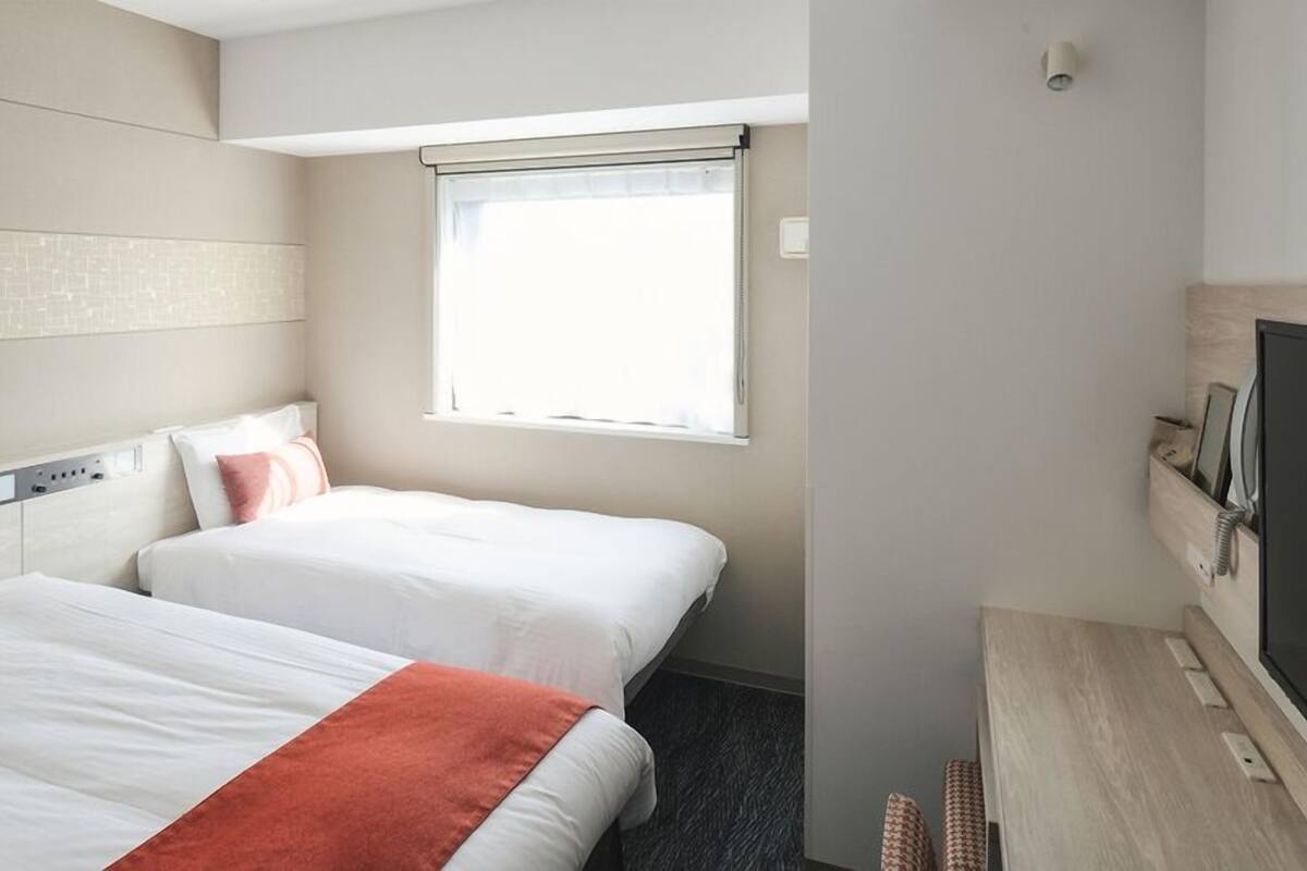 Desk, blackout curtains, iron/ironing board (on request), free WiFi