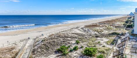On the beach, sun-loungers, beach towels