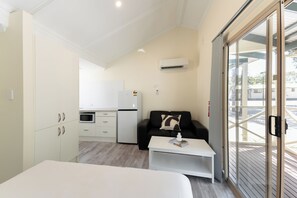 Cabin (Sleeps 2) | Living area | Flat-screen TV - Highway 1 Holiday & Lifestyle Park (Bolivar)