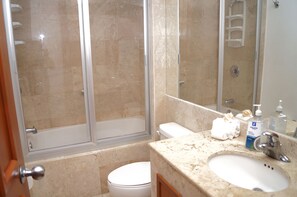 Hair dryer, towels, soap, shampoo