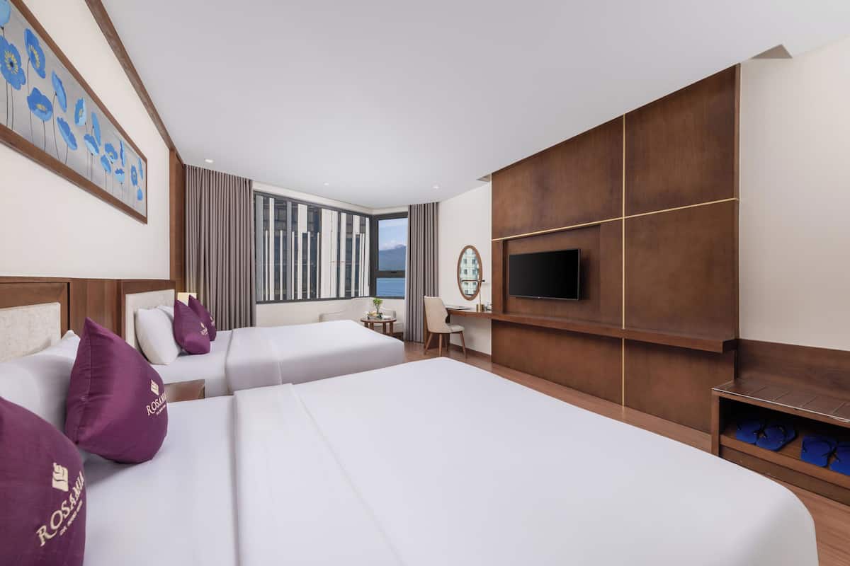 Deluxe Family Room, Partial Ocean View with Afternoon Tea Per Stay | Premium bedding, down comforters, Select Comfort beds, minibar