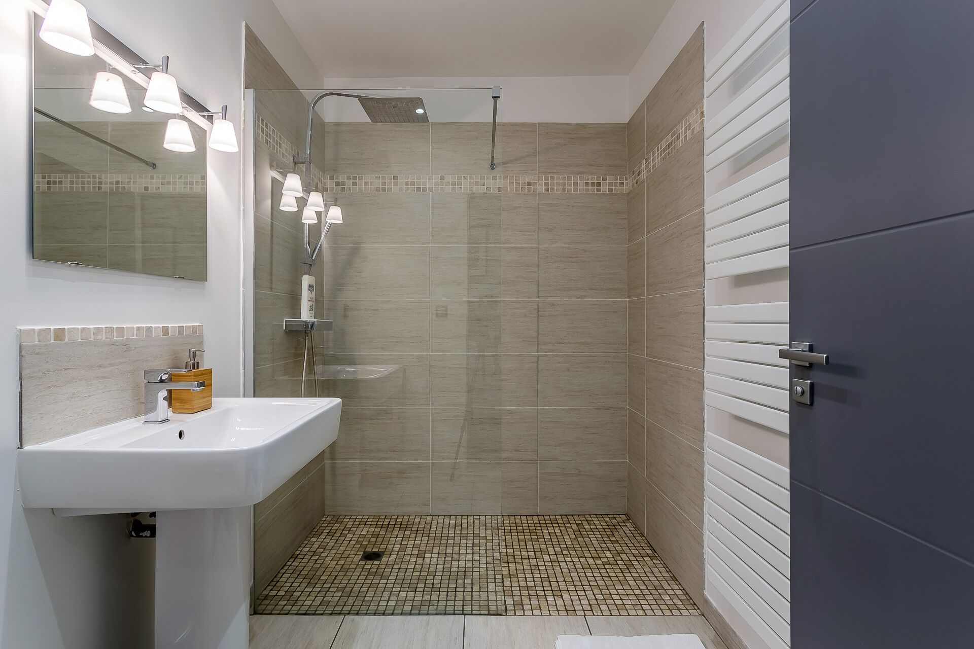 Combined shower/tub, hair dryer, towels, soap