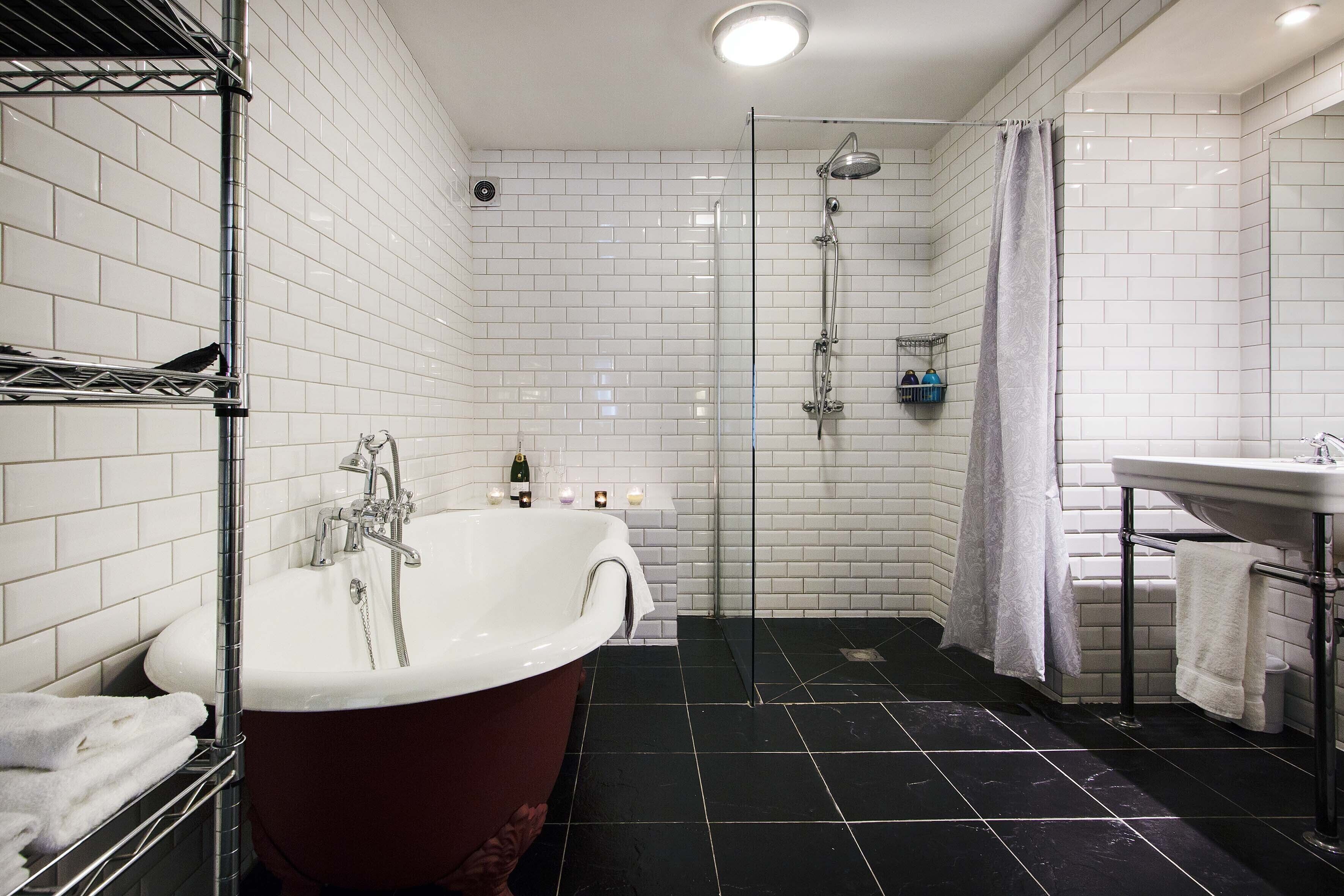 Bathtub, hair dryer, towels, soap