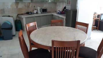 3 Bedroom Apartment  | Private kitchen | Full-sized fridge, microwave, stovetop, electric kettle