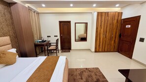 Premium bedding, desk, laptop workspace, iron/ironing board - Kashish Residency & Banquet (Noida)