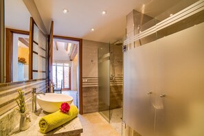 Bathtub, hair dryer, towels