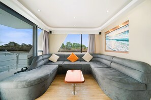 Luxury Houseboat, 4 Bedrooms (Aegean 60) | Living area | LED TV - Coomera Houseboat Holidays (Coomera)