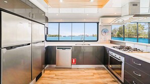 Luxury Houseboat, 4 Bedrooms (Blue Sky) | Private kitchen | Full-size fridge, microwave, oven, stovetop