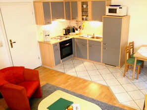 Fridge, microwave, oven, high chair