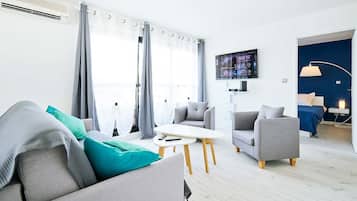 1 dormitorio, tabla de planchar con plancha, wifi y ropa de cama