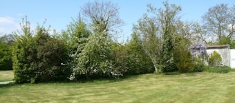 Lodging restored in a contemporain way, in a vast typical farm of Vexin