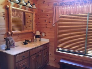 Combined shower/tub, hair dryer, towels, shampoo