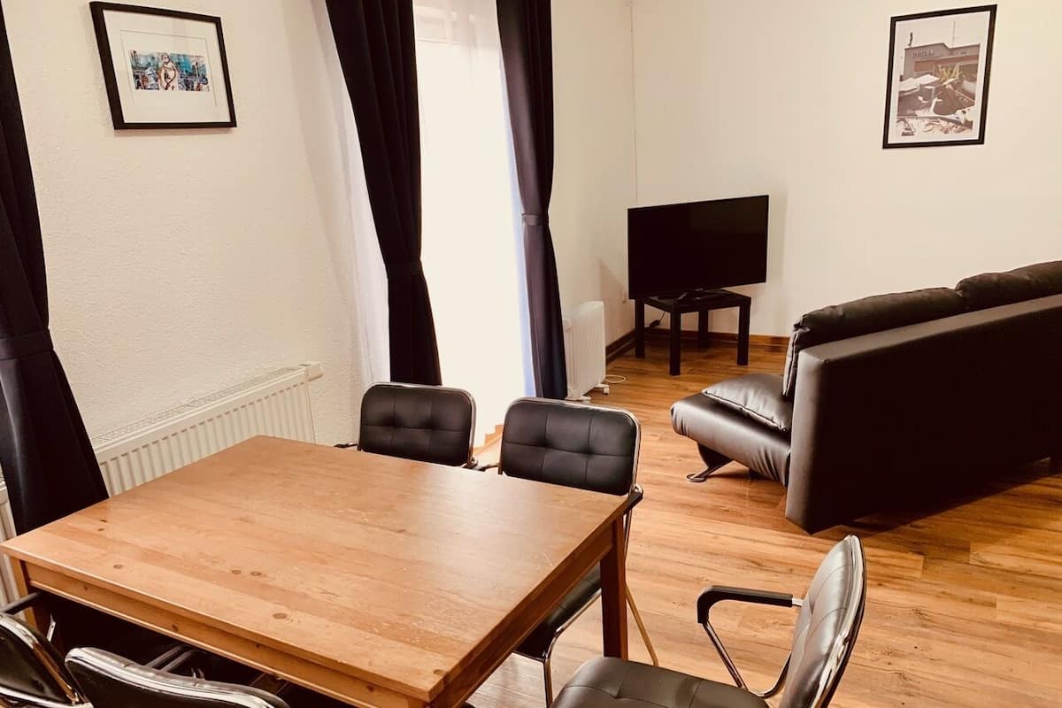 family room, 1 queen bed with sofa bed, non smoking | living area | tv