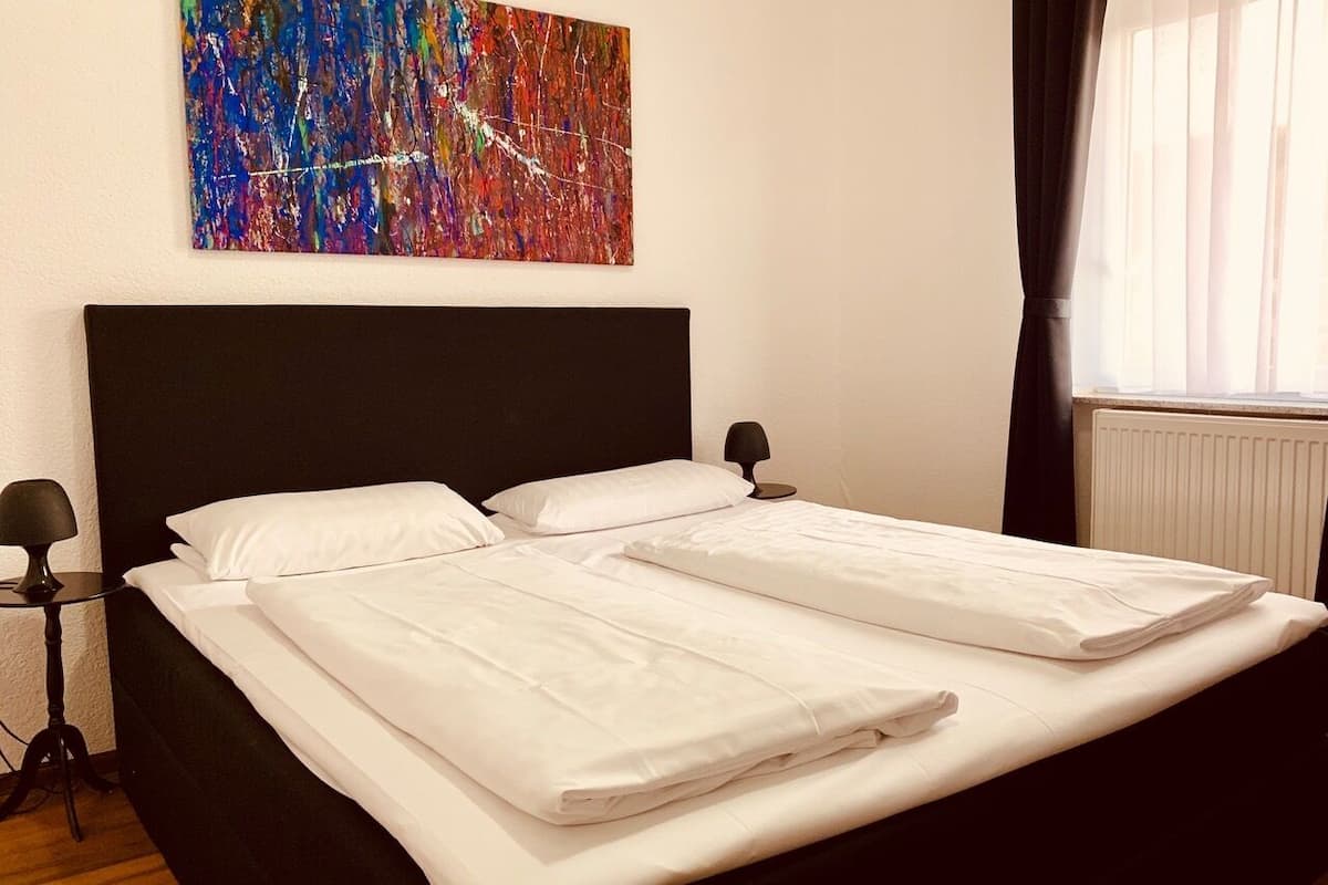 family room, 1 queen bed with sofa bed, non smoking | 2 bedrooms, cots/infant beds, free wifi, bed sheets