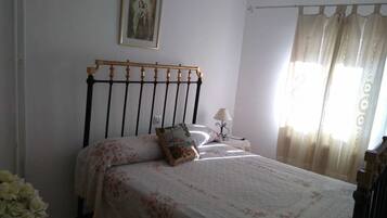 مكواة/لوح كي وملاءات أسرّة