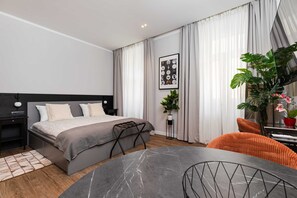 Estudio de diseñador | Ropa de cama de alta calidad y minibar 