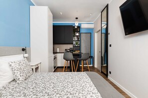 Estudi de disseny | Roba de llit d'alta qualitat i caixa forta a l'habitació 