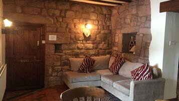 Smithy Cottage | Living area | Flat-screen TV, DVD player, toys