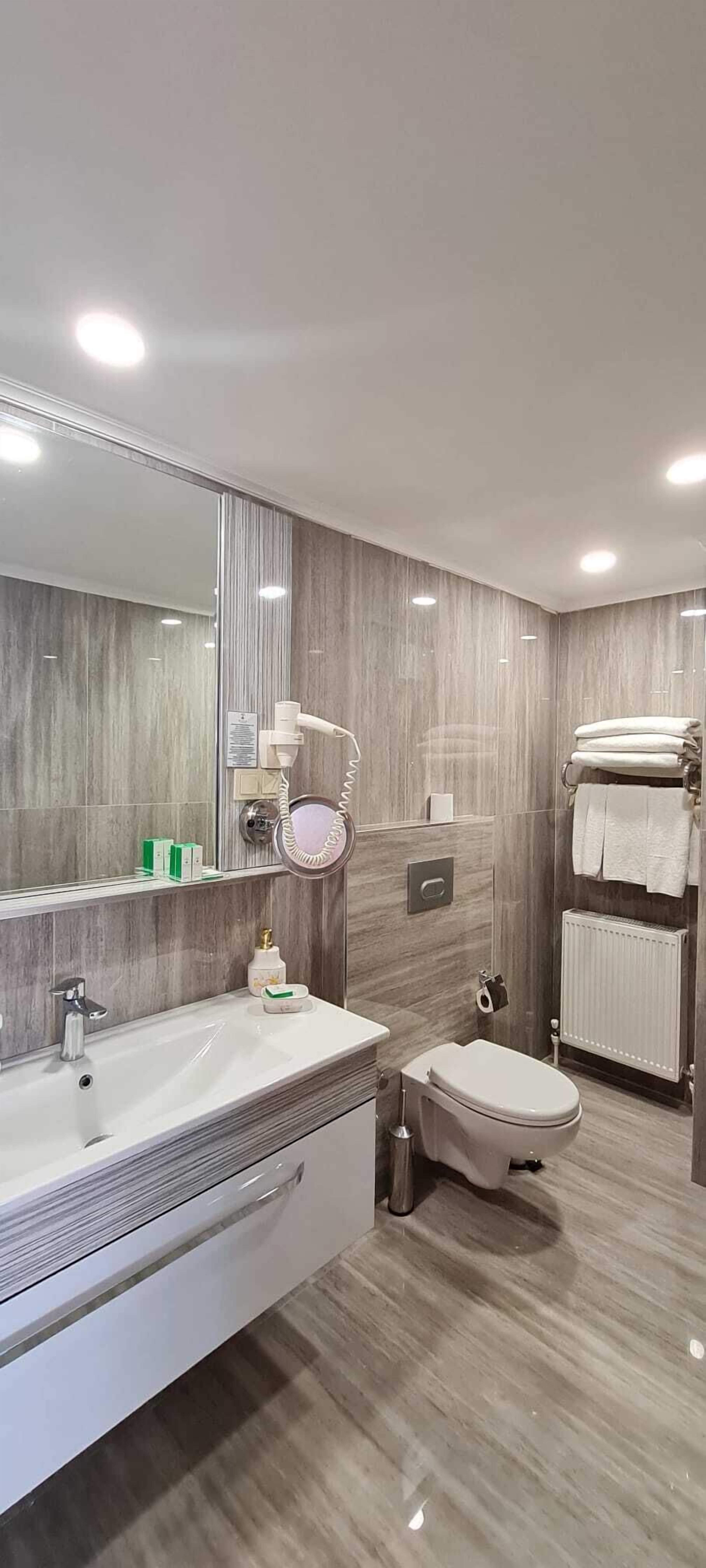 royal suite | bathroom | shower, rainfall showerhead, free toiletries, hair dryer