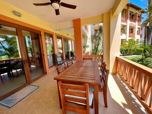 Outdoor dining - Ground Floor 3BR 412: Pool & Beach, Patio,Sleeps 6 (Seine Bight)