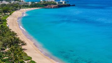 On the beach, sun-loungers, beach towels