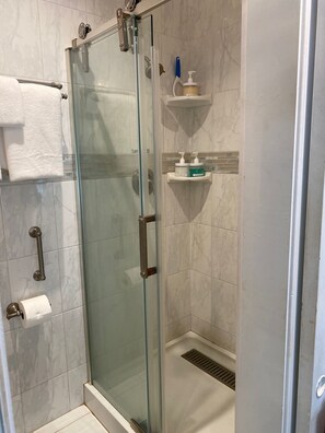 Shower, hair dryer, towels, soap