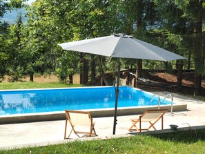 Outdoor pool, pool umbrellas, pool loungers