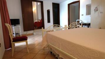 Family Room, 2 Bedrooms, Kitchenette | In-room safe, blackout drapes, iron/ironing board, free WiFi