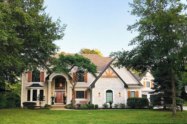 Beautiful home, lower level private suite & quiet wooded creekside backyard.