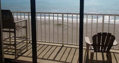 FLOAT ABOVE THE OCEAN!! Top Floor views! Space X Views! Right Downtown!