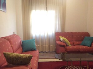 Camera doppia | Area soggiorno | TV a schermo piatto