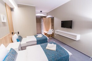 Blackout drapes, soundproofing, iron/ironing board, rollaway beds